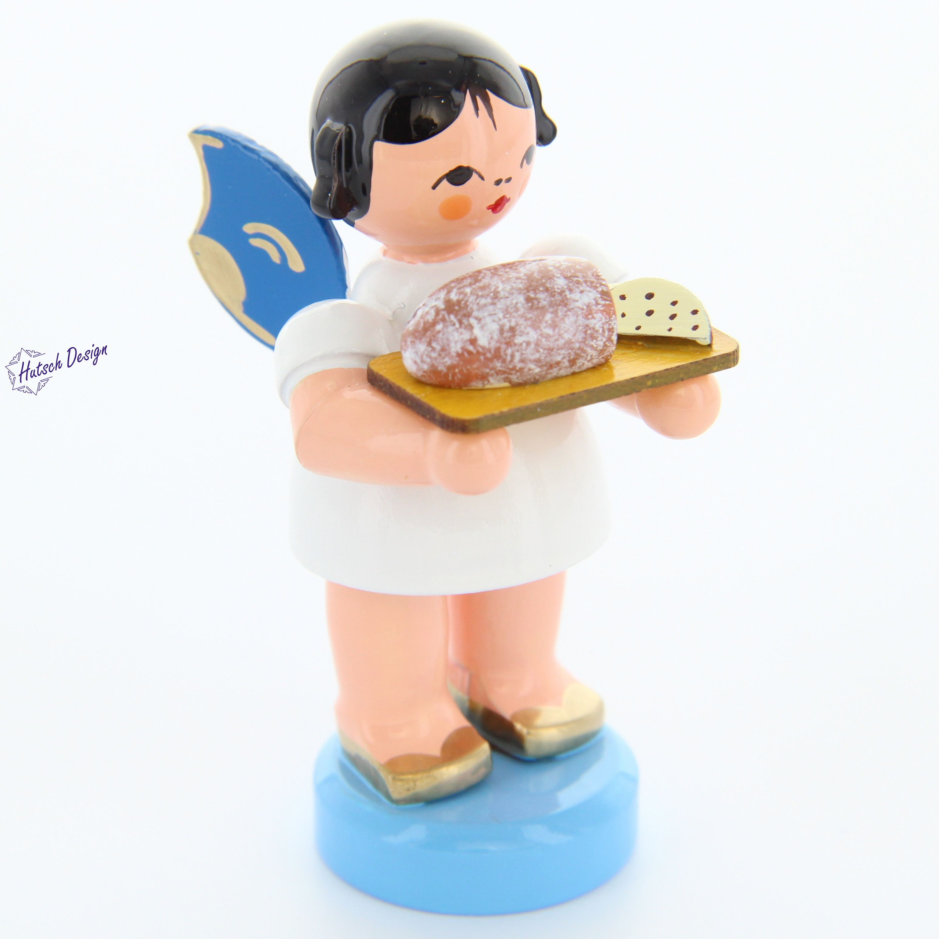 Engel stehend mit Stollenbrett, blaue Flügel