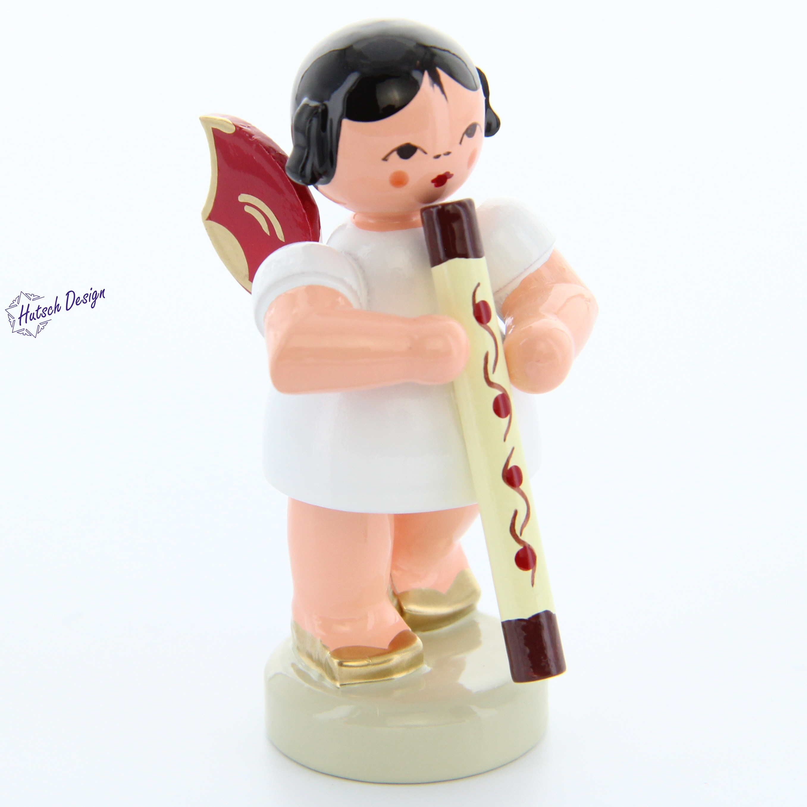 Engel stehend mit Didgeridoo, rote Flügel