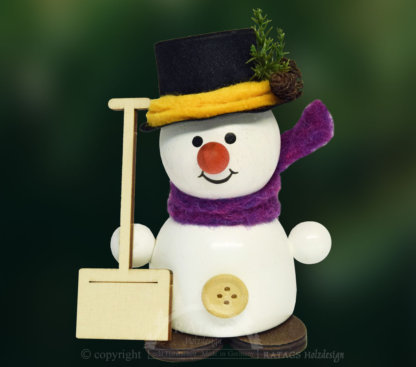 Moppel-Schneemann mit Schneeschieber