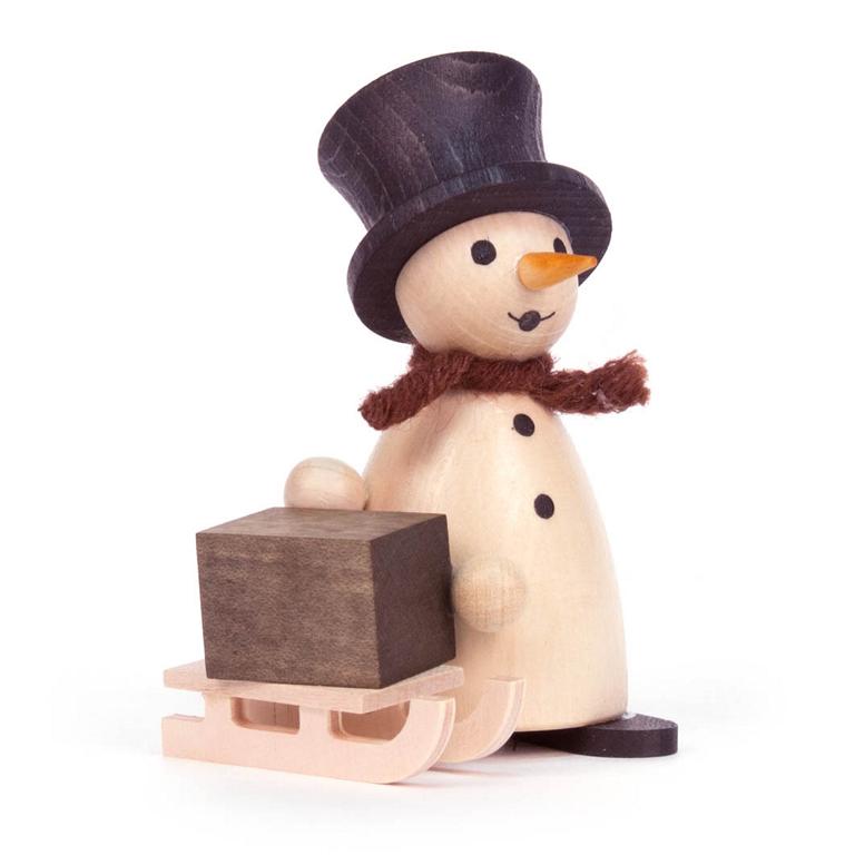 Schneemann mit Schlitten natur