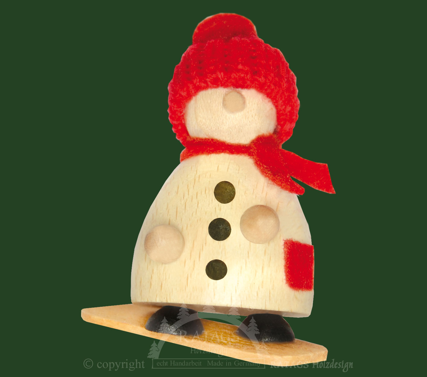 Snow-Molli auf Snowboard, rote Strickmütze