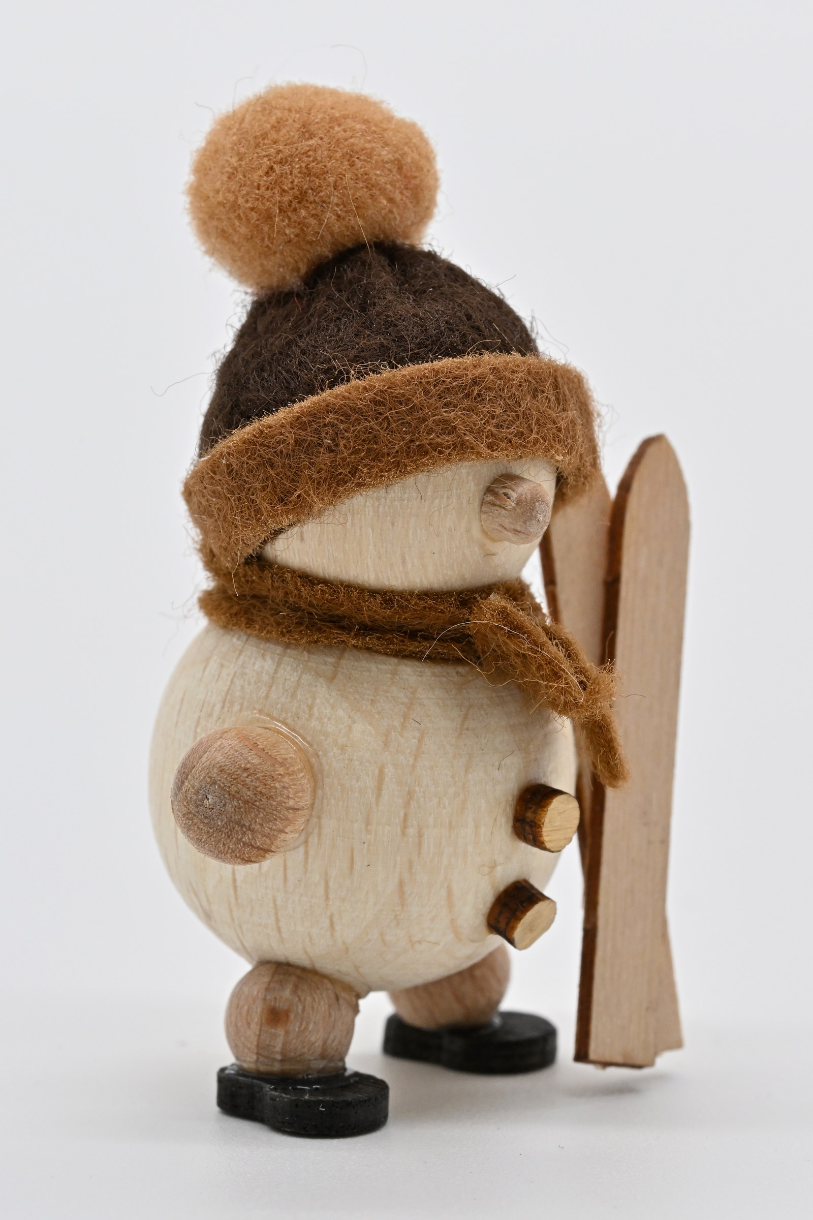 Schneemann, Skiträger