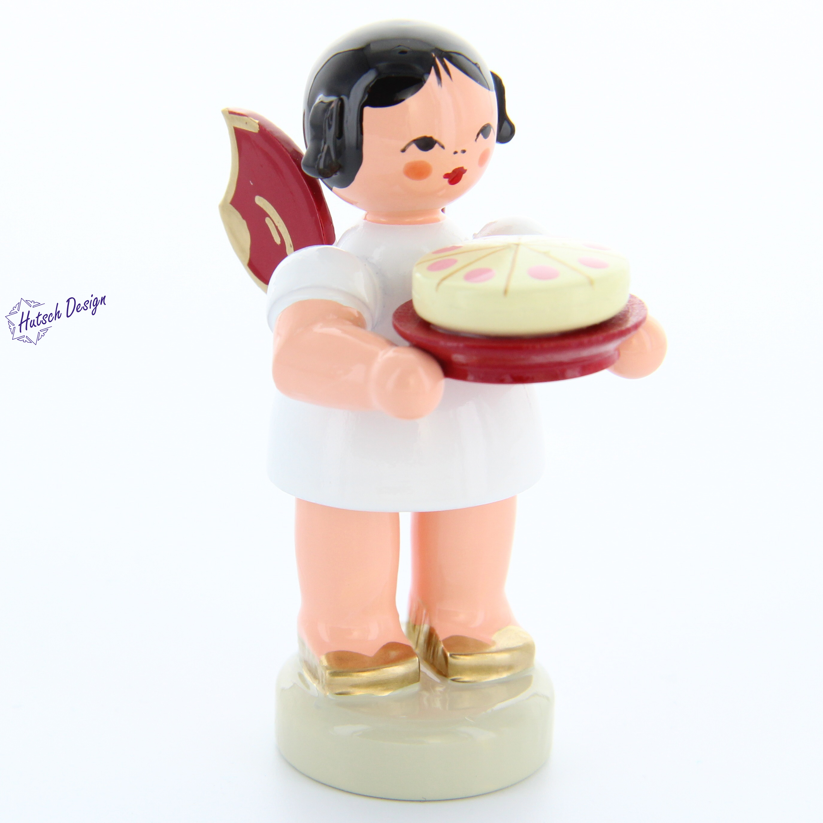 Engel stehend mit Torte, rote Flügel