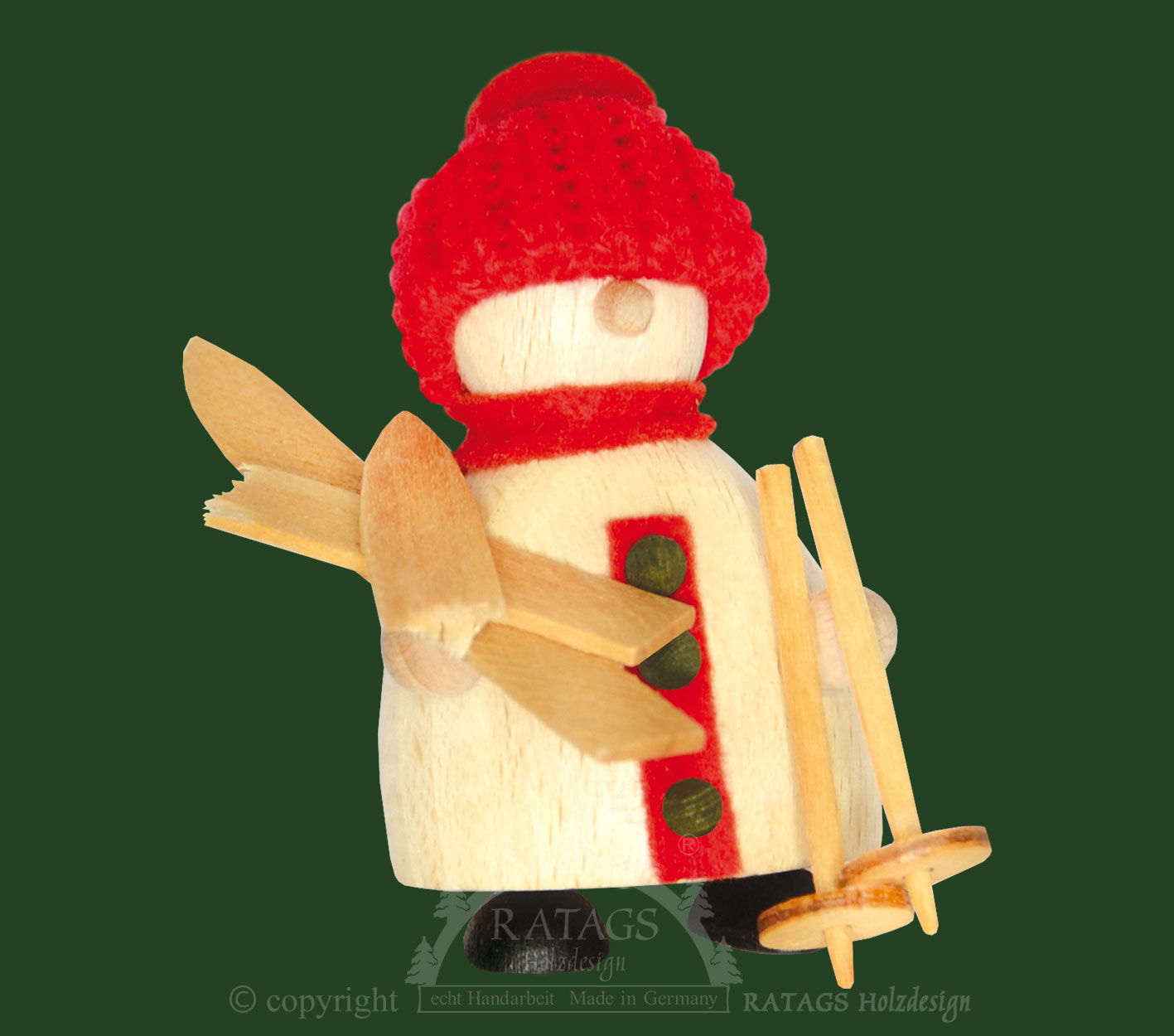Snow-Molli mit Skiern, rote Strickmütze