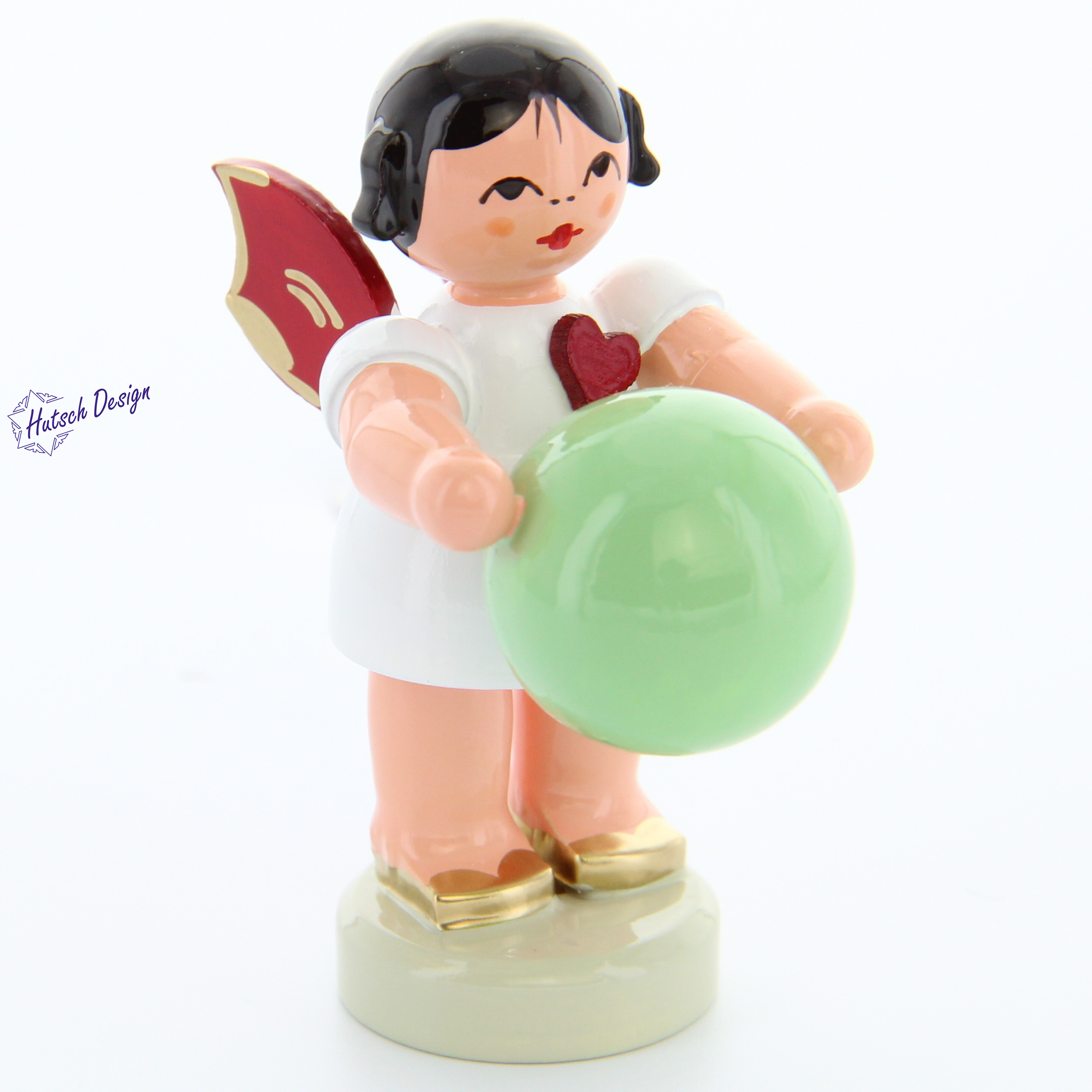 Herzengel stehend mit Gymnastikball, rote Flügel