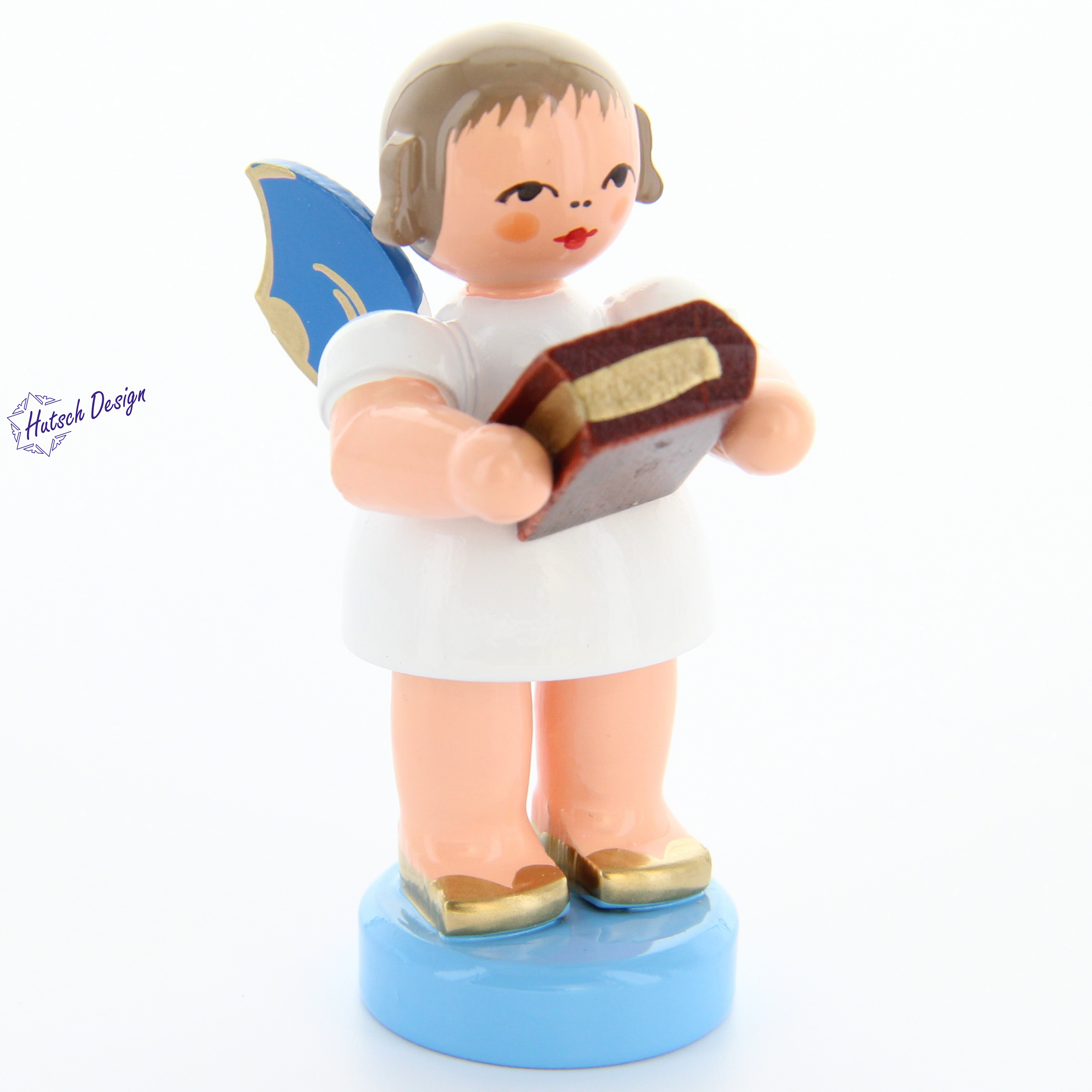 Engel stehend mit Bibel, blaue Flügel