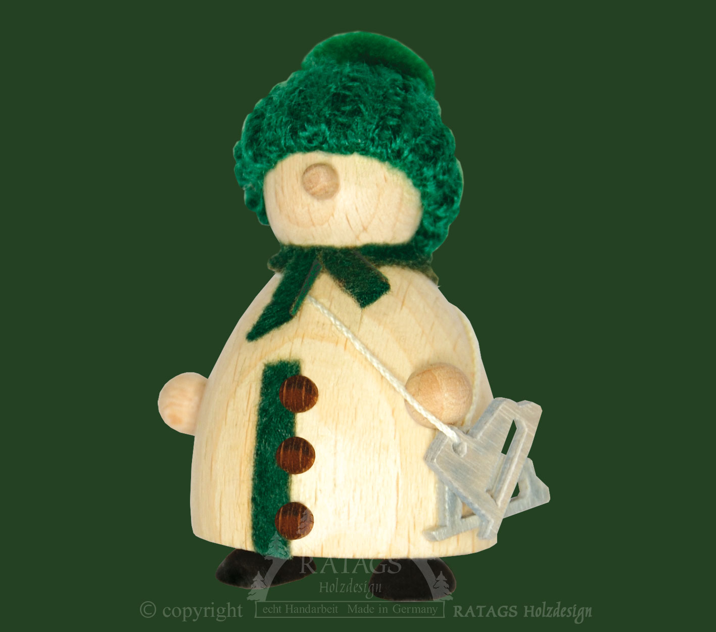 Snow-Molli mit Schlittschuh grüne Strickmütze