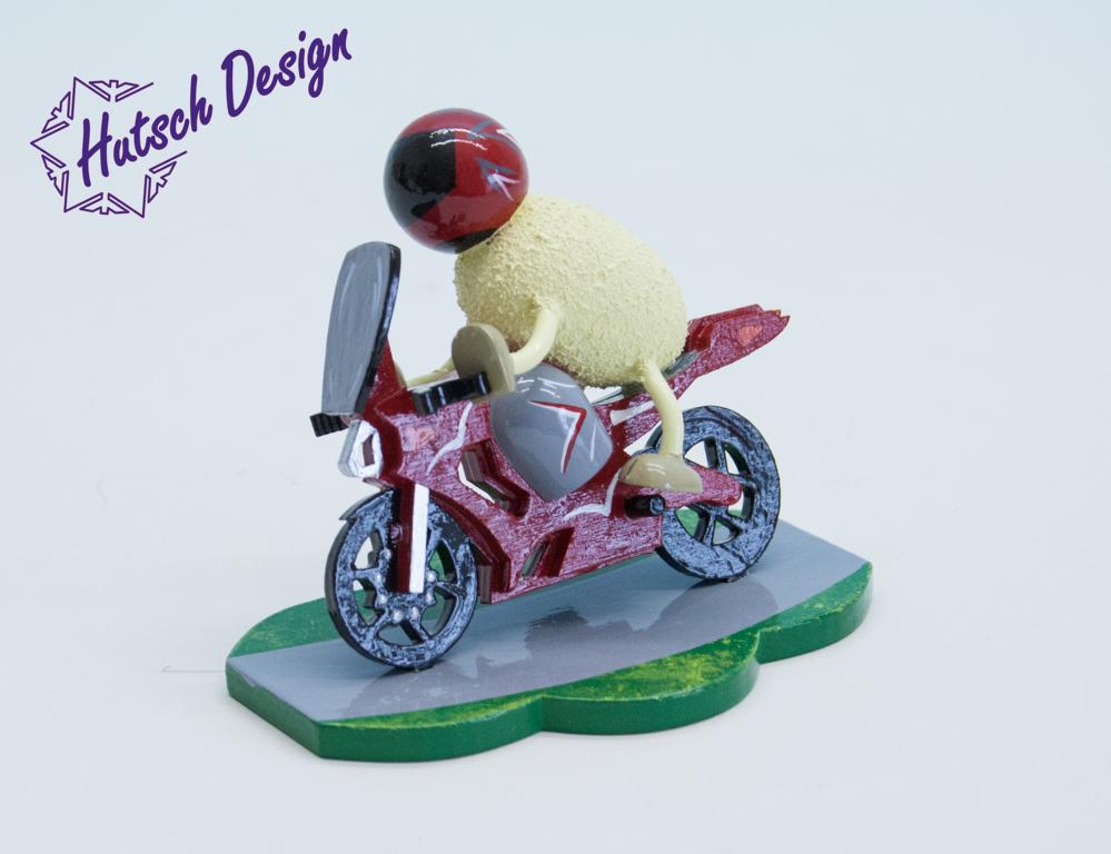 Schaf Racy mit rotem Motorrad 7,5cm